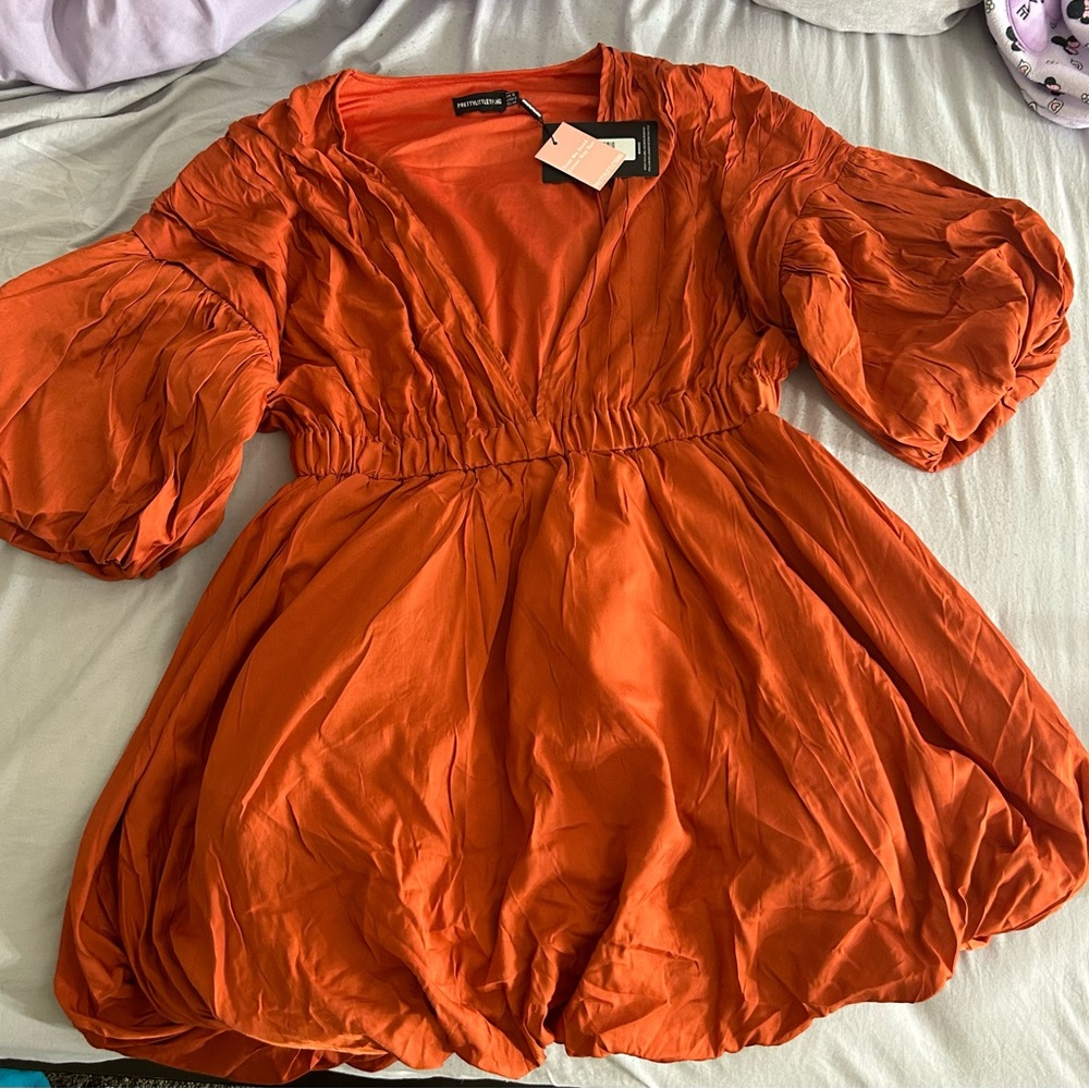 Beautiful rustic orange dress from pretty little thing